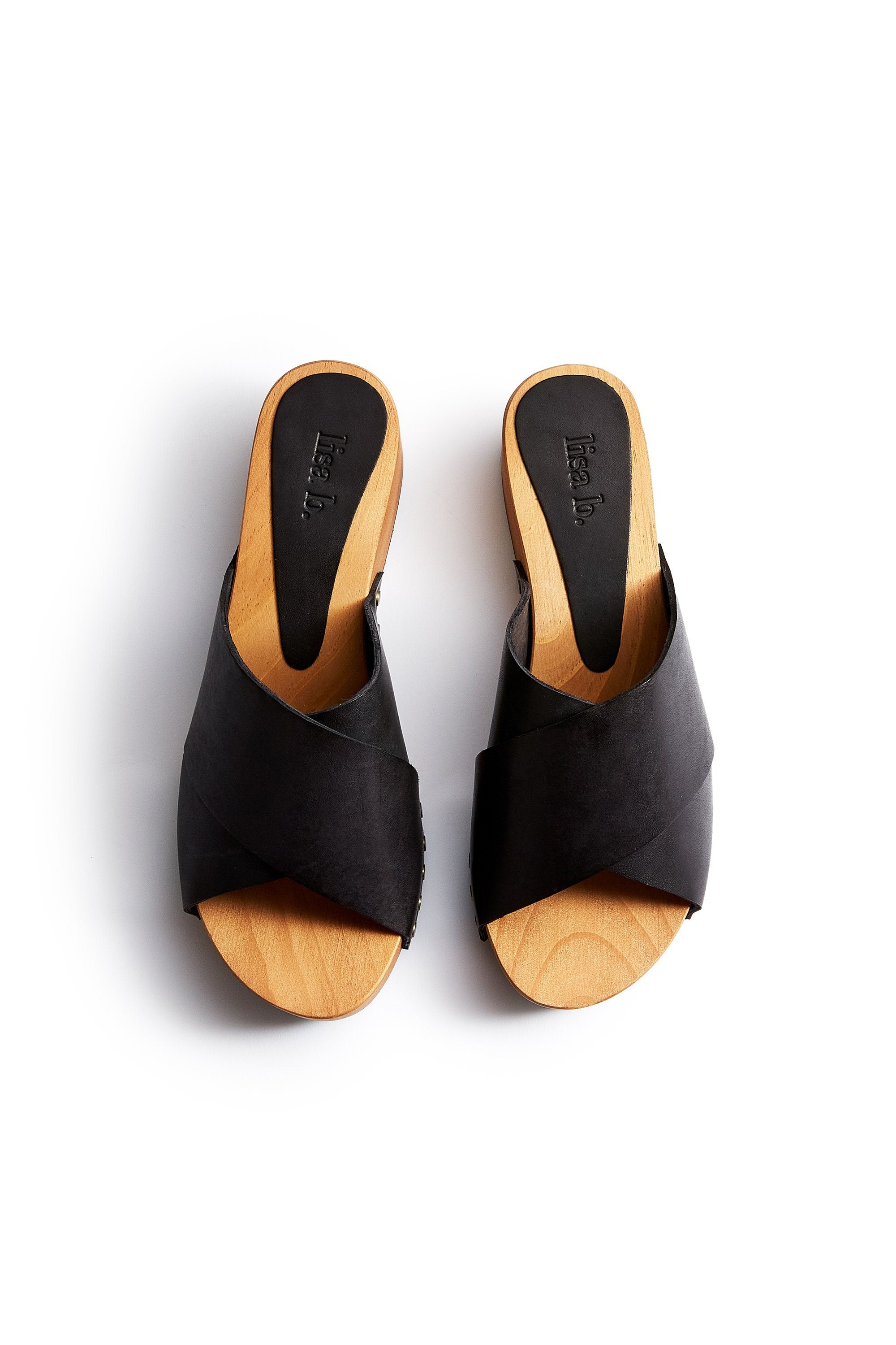 criss-cross leather slide clogs in black Clogs lisa b. 